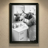 A crisp black and white photograph of a Highland cow looking in a bathroom mirror and holding a razor, with a small sign that says IT'S A PROCESS, created by Artazyn.