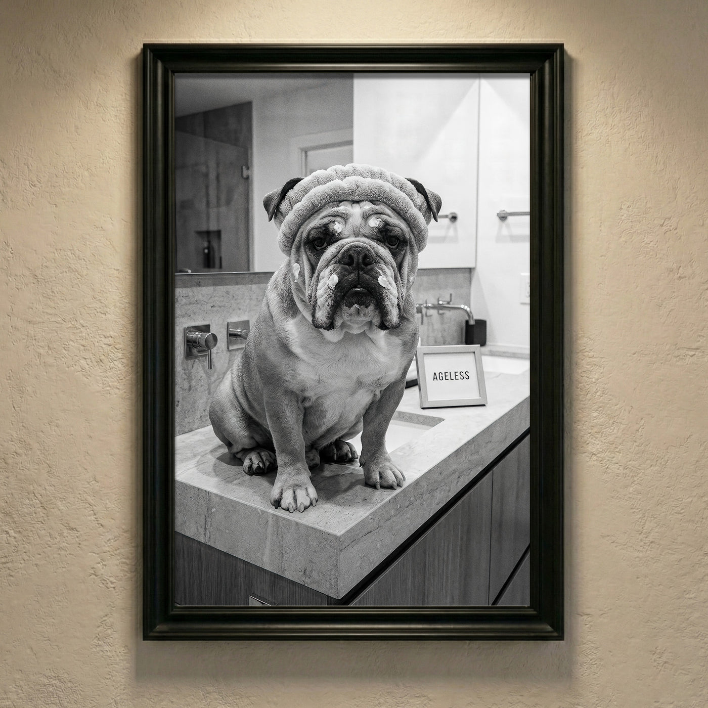 A crisp black and white photograph of a bulldog sitting on a marble bathroom counter wearing a spa headband and face cream next to a sign that says AGELESS, created by Artazyn.