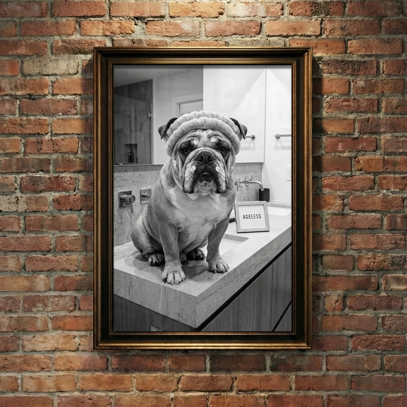 A crisp black and white photograph of a bulldog sitting on a marble bathroom counter wearing a spa headband and face cream next to a sign that says AGELESS, created by Artazyn.