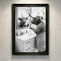 A crisp black and white photograph of a Highland cow looking in a bathroom mirror and holding a razor, with a small sign that says IT'S A PROCESS, created by Artazyn.