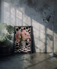 Bold maximalist art print featuring a black and white leopard head vase filled with pink tulips against a patterned background, created by Artazyn.