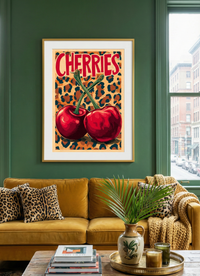 Retro pop art print featuring two large red cherries with green stems crossing against a leopard print background, with the word "CHERRIES" in bold red text.