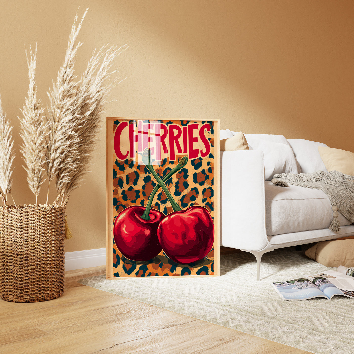 Retro pop art print featuring two large red cherries with green stems crossing against a leopard print background, with the word "CHERRIES" in bold red text.