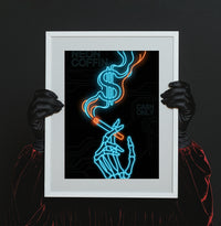 Cyberpunk neon art print of a skeleton hand holding a cigarette with smoke forming a dollar sign, featuring text "Neon Coffin" and "Cash Only" in blue and orange, created by Artazyn.