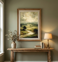 Textured oil painting style art print of rolling green hills and a winding river under a moody overcast sky, created by Artazyn.