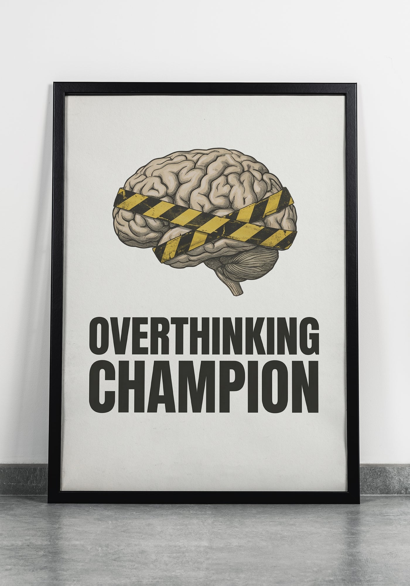 Framed poster with brain illustration and 'Overthinking Champion' text on a rustic wall.