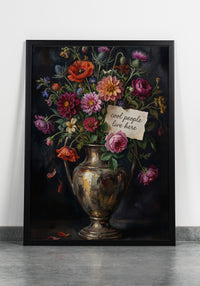 Decorative still life painting with flowers and a vase on a wooden table against a dark green wall.